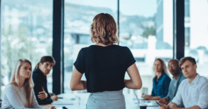 woman leading meeting in conference room