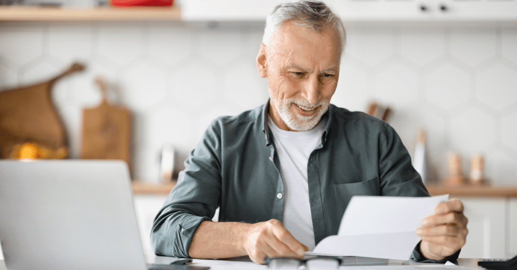 man reading retirement letter