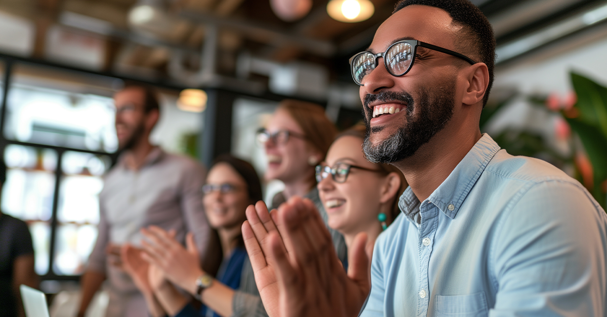 group of employees applauding